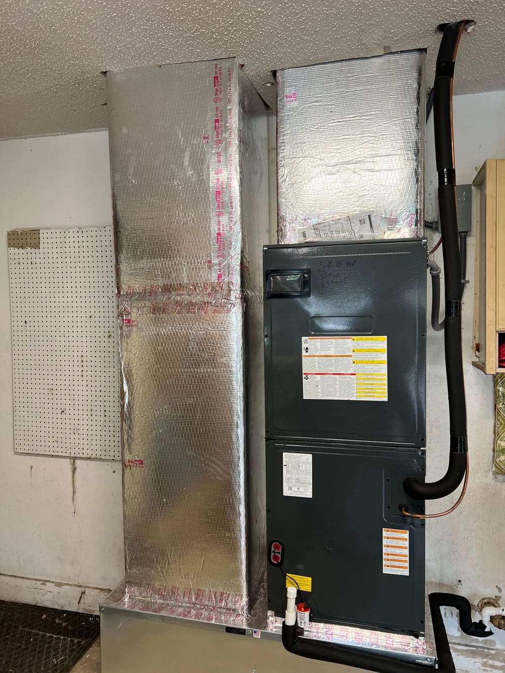 New AC air handler with fully sealed, insulated plenum ductwork installed by Lightning Fast A/C & Heating in Lithia, FL